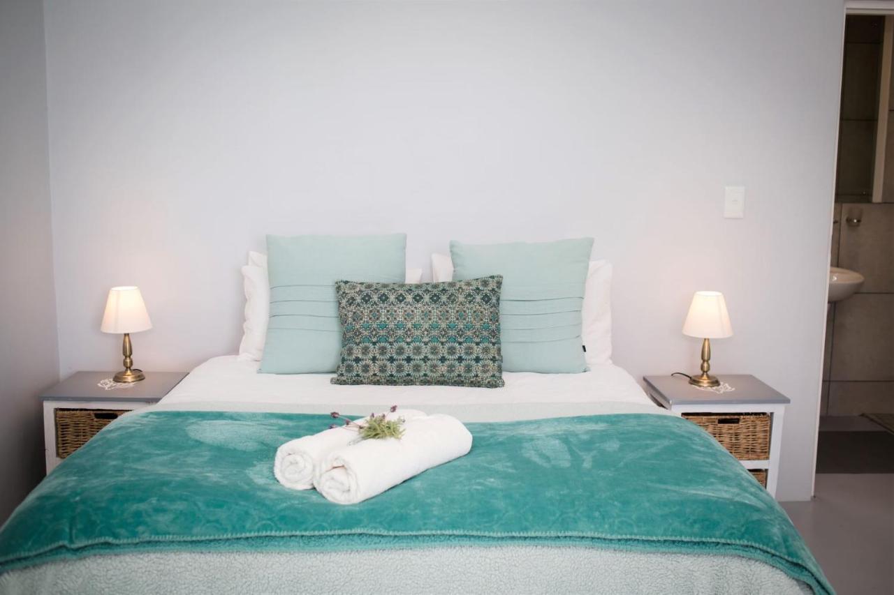 Three Feathers Cottages ลางเงอบาน ภายนอก รูปภาพ