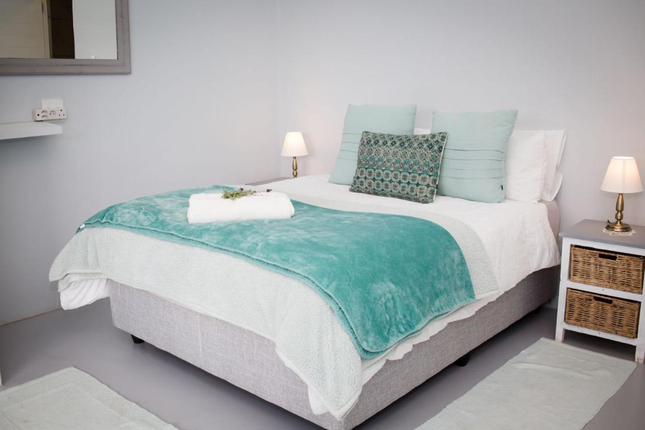 Three Feathers Cottages ลางเงอบาน ภายนอก รูปภาพ