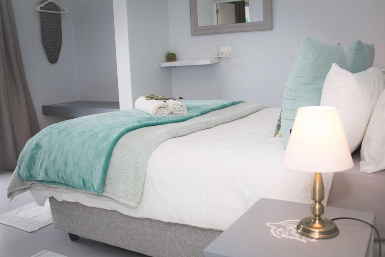 Three Feathers Cottages ลางเงอบาน ภายนอก รูปภาพ