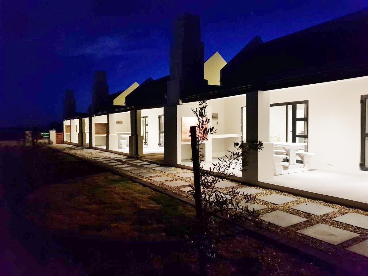 Three Feathers Cottages ลางเงอบาน ภายนอก รูปภาพ