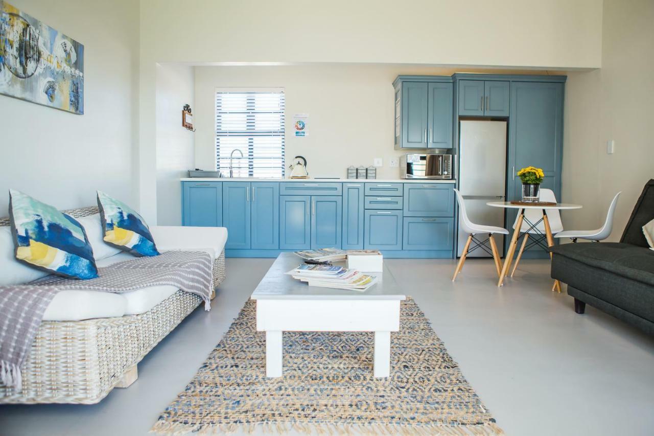 Three Feathers Cottages ลางเงอบาน ภายนอก รูปภาพ
